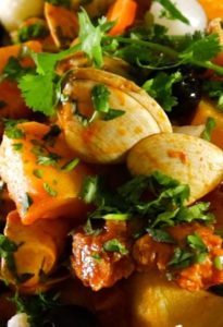Carne de porco com amêijoas.